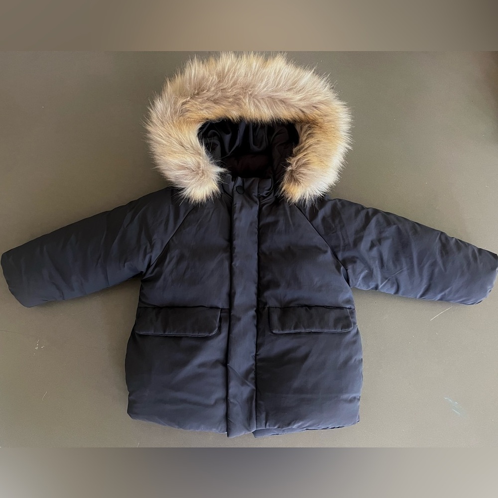Water Repellant Faux Fur Hooded Down Puffer Jacket.